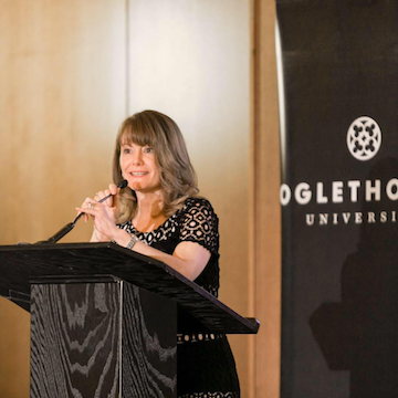 Karen receiving the Distinguished Alumni Award at Oglethorpe University